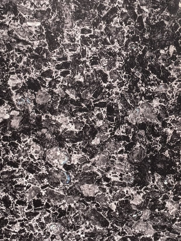 Coalface — near-black stone with silver mottle